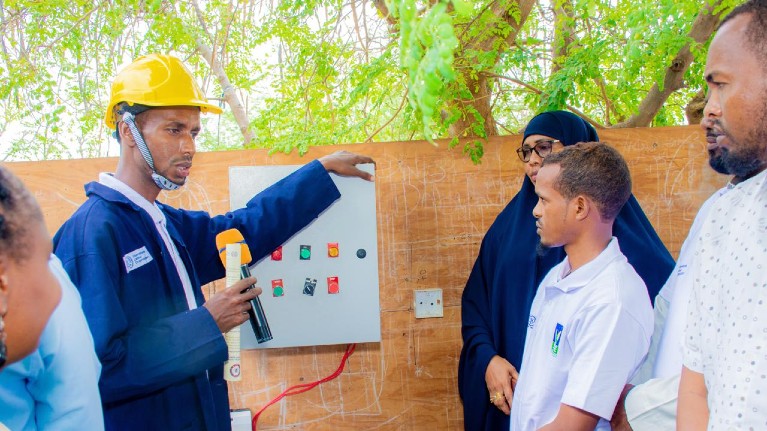 Trainees showing operation of water points in the community ©ILO