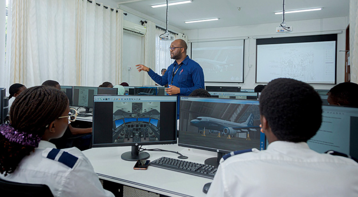 NIT students learning with the virtual maintenance trainer provided by the EASTRIP Project. Photo: True Vision Production / World Bank